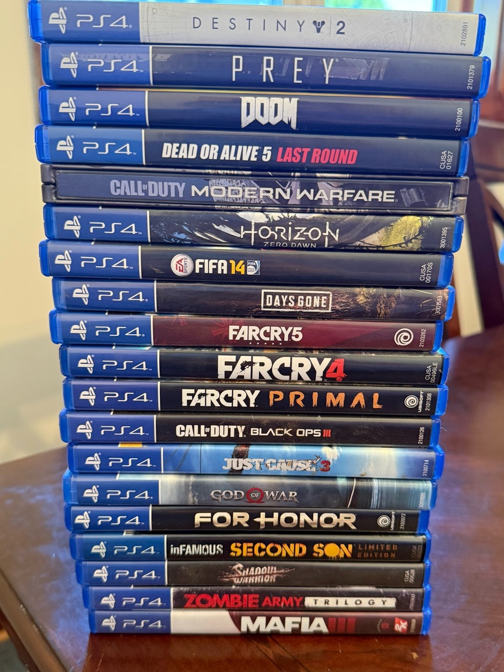 Sony PS4 Game Case Lot with Blue Spines - Mixed Titles
